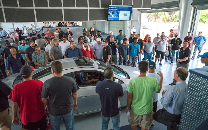 People bidding on a car at AutoNation Auto Auction Orlando