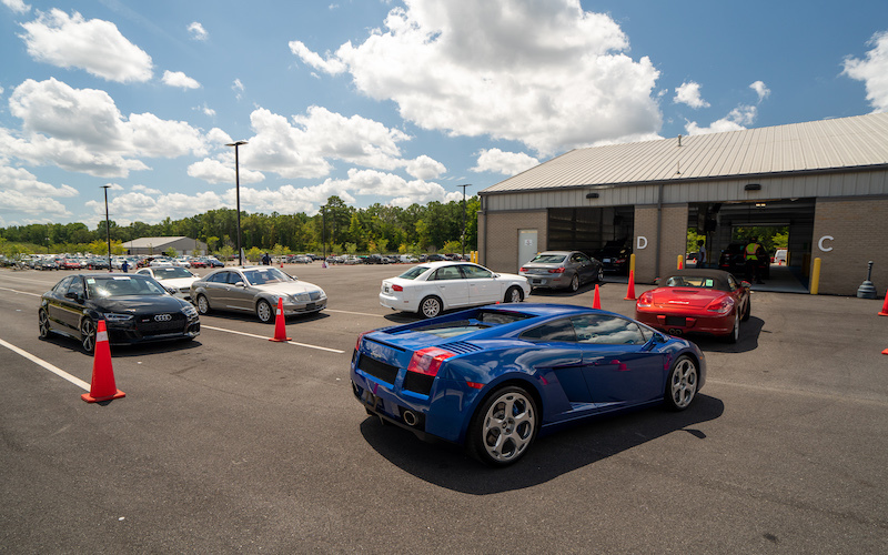Cars lining up at an AutoNation Auto Auction